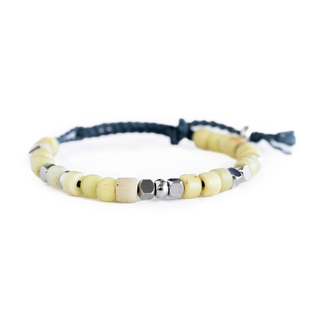 Enfrentando el mundo de la mano - Pulsera - Limón